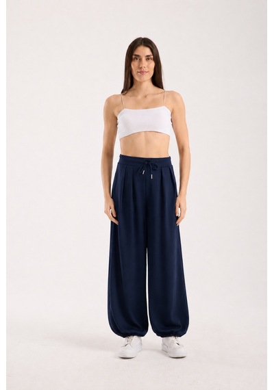 Gugus Kadın Modal Kumaş Şalvar Trend Model Paça Ve Bel Detaylı Rahat Kesim Eşofman Koyu Lacivert Gugus Kadın Modal Kumaş Şalvar Trend Model Paça Ve Bel Detaylı Rahat Kesim Eşofman Koyu Lacivert
