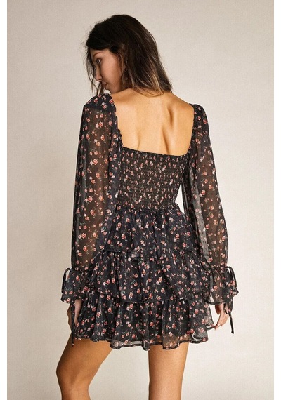 Fashion Cocktail Göğüs Korseli Sırt Lastikli Çiçekli Uzun Kol Bağlamalı Dudak Göğüslü Şifon Elbise Siyah Fashion Cocktail Göğüs Korseli Sırt Lastikli Çiçekli Uzun Kol Bağlamalı Dudak Göğüslü Şifon Elbise Siyah
