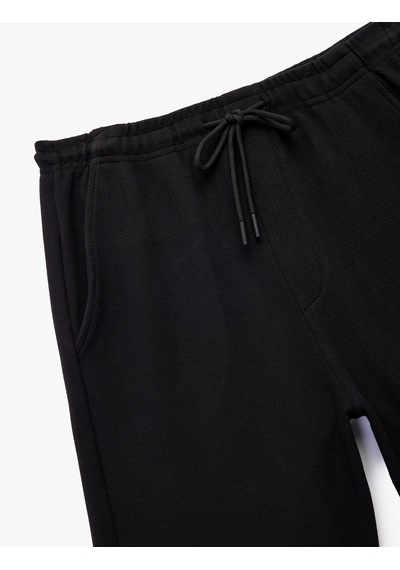 Koton Beli Bağcıklı Pamuklu Cep Detaylı Spor Şort Siyah 6wam40071nk Siyah Koton Beli Bağcıklı Pamuklu Cep Detaylı Spor Şort Siyah 6wam40071nk Siyah