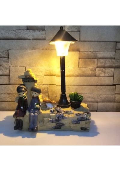Taş Duvar Üstünde Oturan Sevgili Çift Işıklı Biblo