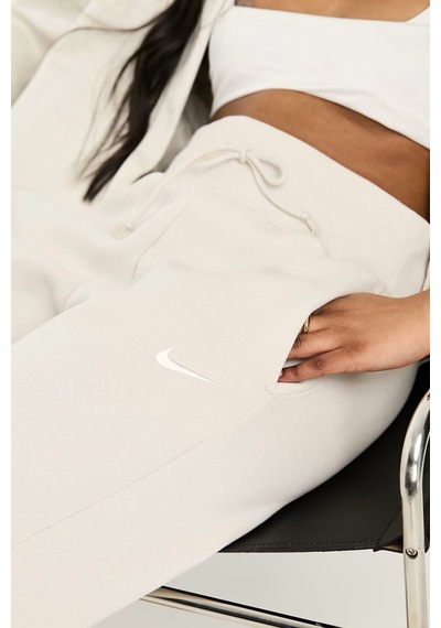 Nike Phoenix Fleece Wide High Rise Sweatpants Kadın Yüksek Bel Yırtmaçlı Geniş Paça Eşofman Altı Krem Krem Nike Phoenix Fleece Wide High Rise Sweatpants Kadın Yüksek Bel Yırtmaçlı Geniş Paça Eşofman Altı Krem Krem