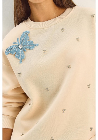 Shade Kadın Bisiklet Yaka Kelebek Aksesuarlı Taş Işlemeli Üç İplik Şadonlu Sweatshirt 60601042 - Bej Shade Kadın Bisiklet Yaka Kelebek Aksesuarlı Taş Işlemeli Üç İplik Şadonlu Sweatshirt 60601042 - Bej