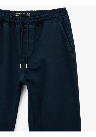 Koton Regular Fit Normal Bel Pamuklu Bol Beli Bağcıklı Baggy Jean Pantolon Lacivert 6sam40265nd