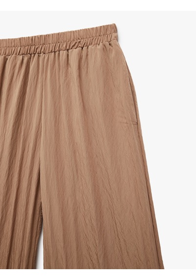 Koton Dokulu Viskon Kumaş Cepli Düz Geniş Paça Pantolon Kahverengi 5sak40452pw Kahve Kahverengi Koton Dokulu Viskon Kumaş Cepli Düz Geniş Paça Pantolon Kahverengi 5sak40452pw Kahve Kahverengi
