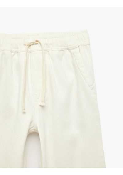 Koton Pamuklu Beli Bağcıklı Cepli Rahat Kesim Denim Pantolon Beyaz 6skb40016td