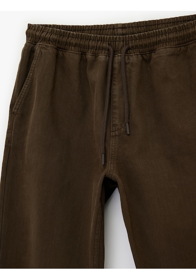 Koton Regular Fit Cepli Beli Bağcıklı Bol Baggy Jean Pantolon Kahverengi 6sam40213nd Kahverengi
