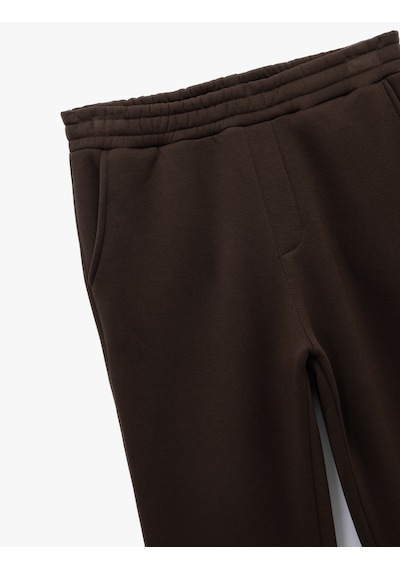 Koton Straight Fit Cep Detaylı Şardonlu Beli Lastikli Kışlık Eşofman Altı Kahverengi 6wam40033mk Kahverengi Koton Straight Fit Cep Detaylı Şardonlu Beli Lastikli Kışlık Eşofman Altı Kahverengi 6wam40033mk Kahverengi