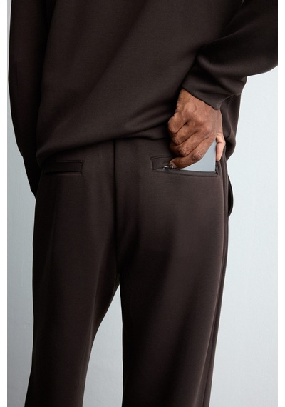 Defacto Ultra Yumuşak Baggy Fit Elastik Bel Ön Dikiş Detaylı Dalgıç Kumaş Jogger Pantolon H6171ax26aubn338 Kahve-bn338