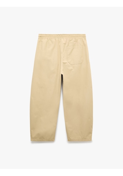 Koton Rahat Kalıp Beli Bağcıklı Cep Detaylı Pamuklu Gabardin Barrel Pantolon Bej 7wam40077nw Ekru Koton Rahat Kalıp Beli Bağcıklı Cep Detaylı Pamuklu Gabardin Barrel Pantolon Bej 7wam40077nw Ekru