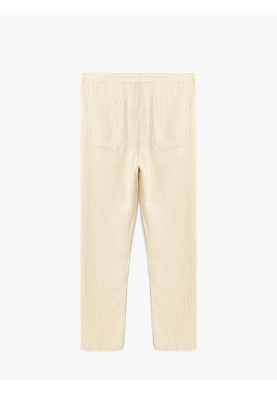 Koton Pamuklu Müslin Chino Cep Detaylı Beli Bağcıklı Pantolon Bej 5sam40011hw Ekru Koton Pamuklu Müslin Chino Cep Detaylı Beli Bağcıklı Pantolon Bej 5sam40011hw Ekru