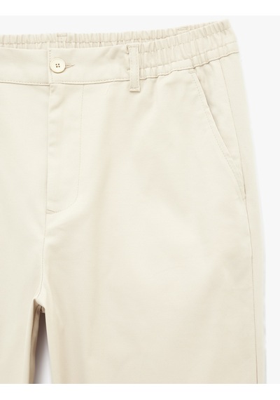 Koton Pamuklu Regular Fit Cepli Beli Lastikli Gabardin Yazlık Chino Pantolon Bej 6sam40108hw Ekru Koton Pamuklu Regular Fit Cepli Beli Lastikli Gabardin Yazlık Chino Pantolon Bej 6sam40108hw Ekru